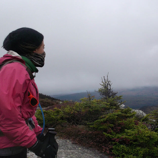 buff on hiker in windy weather