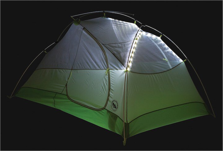 The Big Agnes tent all lit up at night.