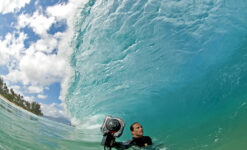 Surf Photographer stares down shorebreak to get the perfect shot.