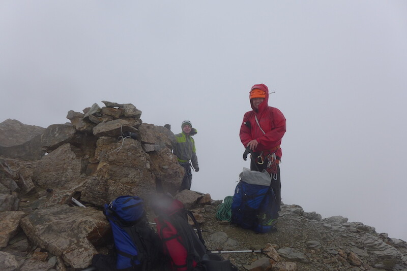 Climbers happy and dry in their GoreTex jackets.
